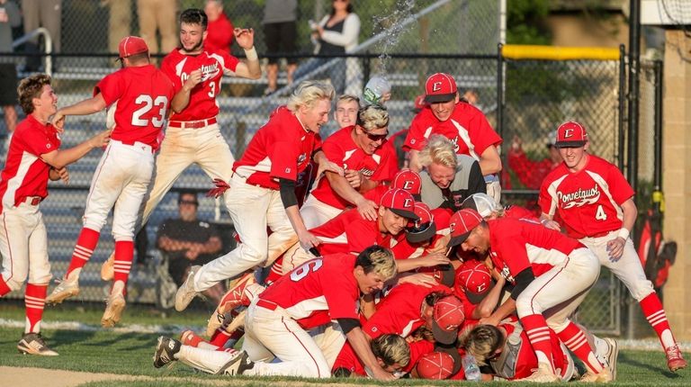Connetquot players and coaches celebrate after defeating Ward