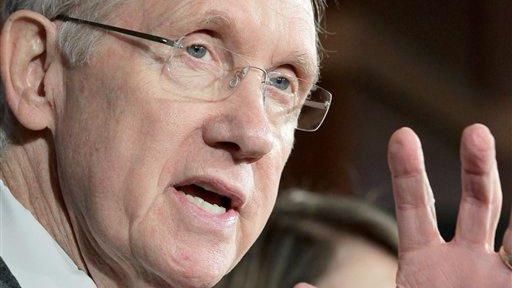 Senate Majority Leader Harry Reid gestures during a