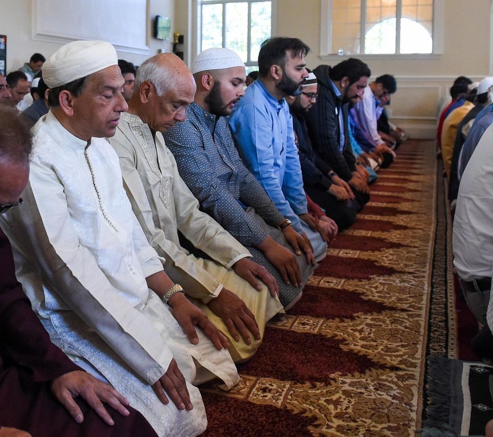 Men pray at the Selden Mosque on the