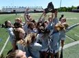 Mattituck/Southold players lift the championship plaque after the