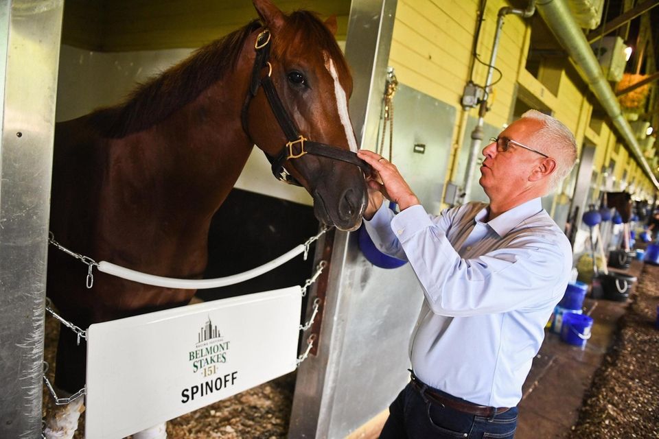 Horse trainer Todd Pletcher with horse Spinoff at
