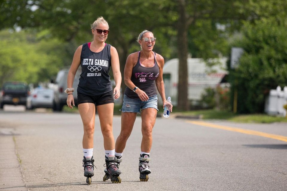 Laurie Keane of Babylon Village, right, and her
