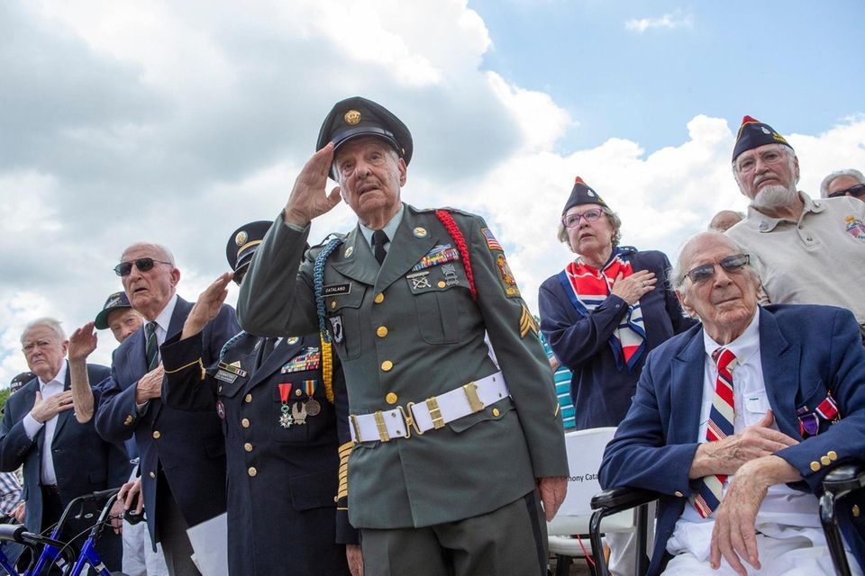 From left, World War II veterans Cyril Tozer,