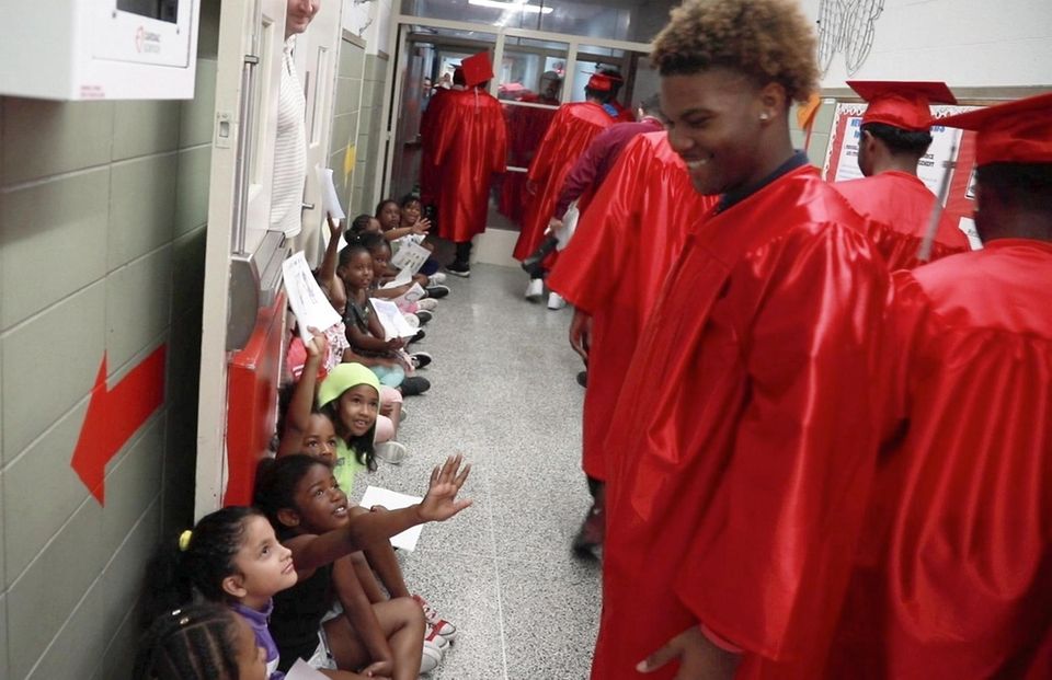 Amityville Memorial High School seniors were cheered as