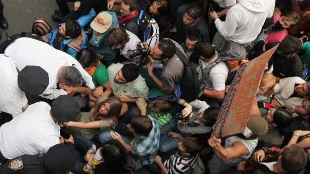 Police arrest demonstrators affiliated with the Occupy Wall