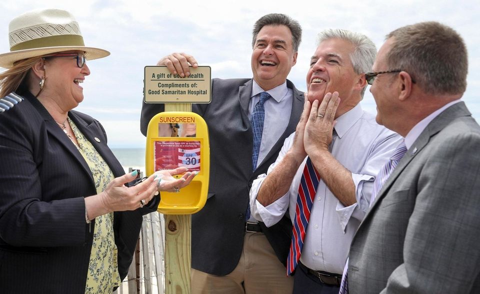 Surrounded, from left, by Suffolk County Legislator, Susan