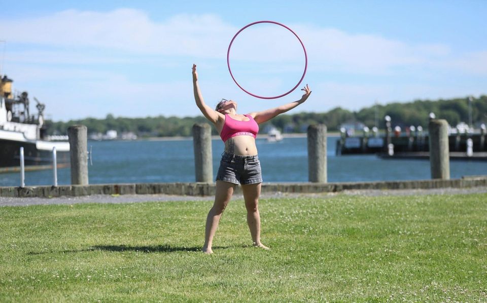 Veronica Davis practices her hoop dancing routines in