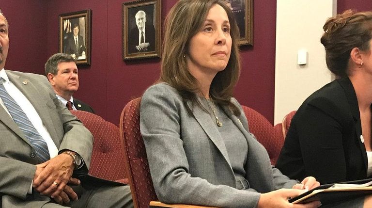 Suffolk police Commissioner Geraldine Hart, center, at the