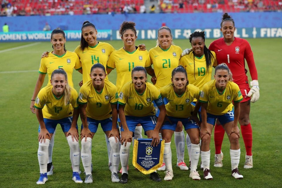 Brazil players pose for a photo before the
