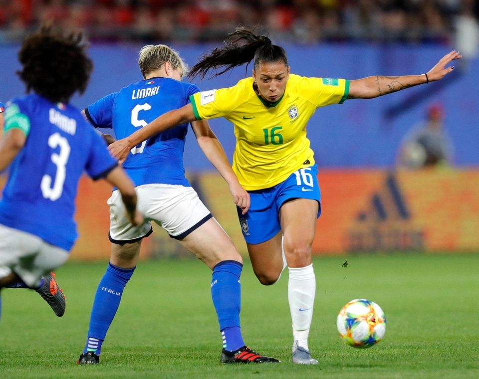 Brazil's Beatriz, right, duels for the ball with