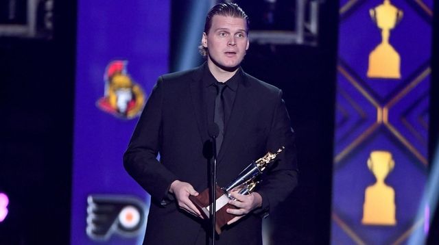 Robin Lehner of the Islanders accepts the Bill... Robin Lehner of the Islanders accepts the Bill