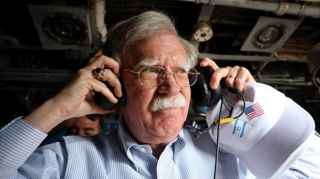National security adviser John Bolton on a flight... National security adviser John Bolton on a flight