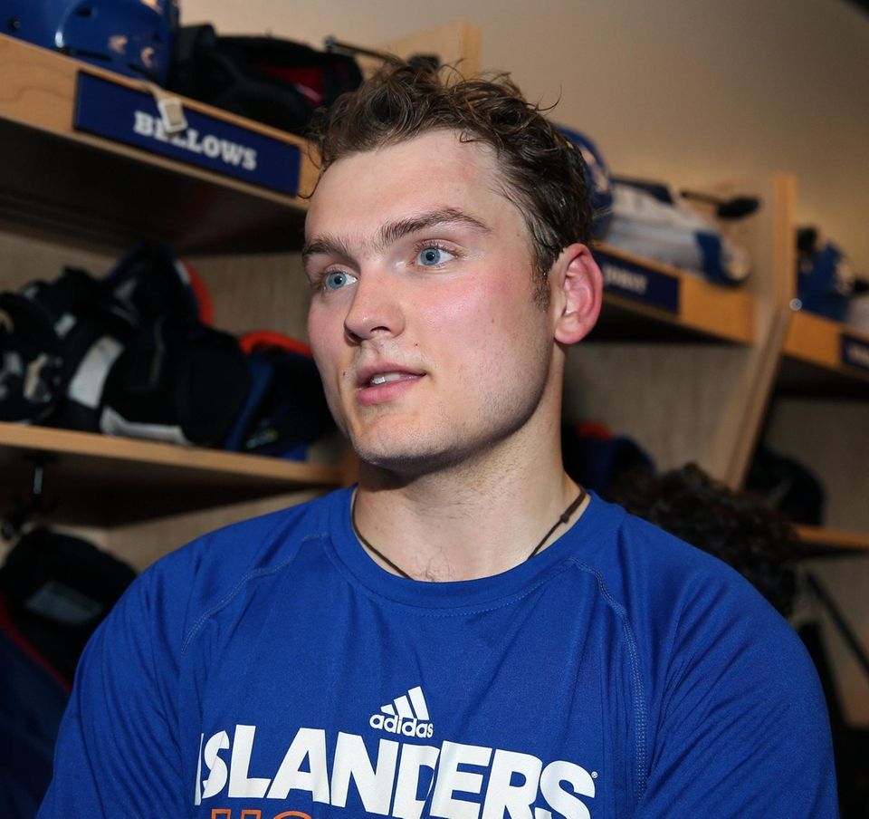 Defenseman Kieffer Bellows talks to media as Islanders