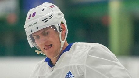 The Rangers' Adam Fox skates during prospect development