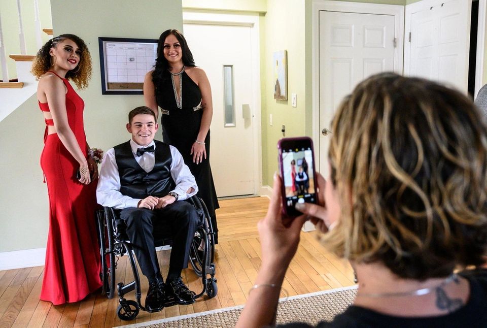 Robert Browne and his prom dates Jade Burkes