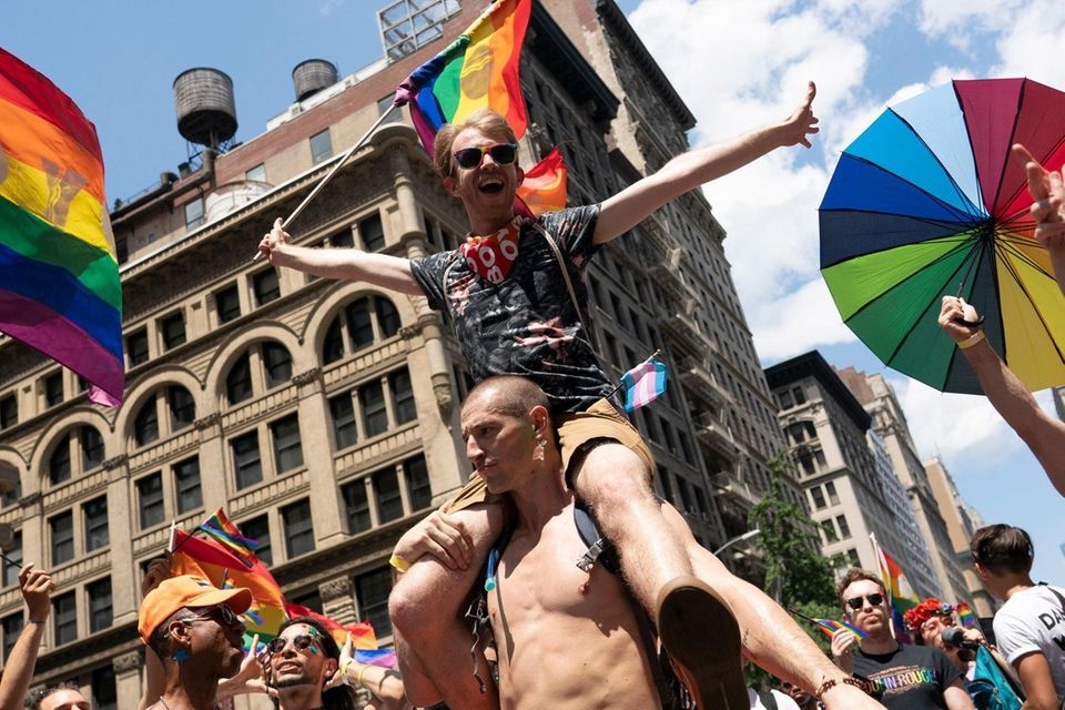 Pilobolus dancers march and dance during the NYC