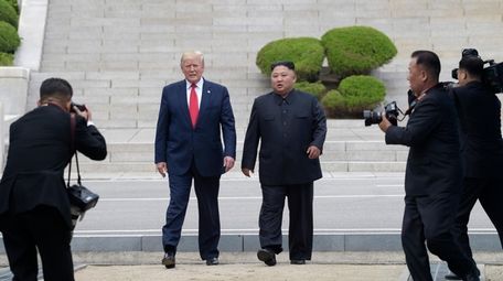 President Donald Trump, center left, and North Korean