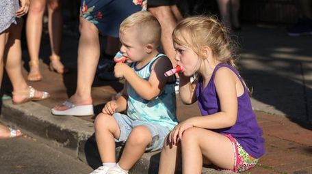 Ryder Lynam, 3, left, and his sister Grace,