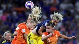 Netherlands' Sherida Spitse, front, fights for a header
