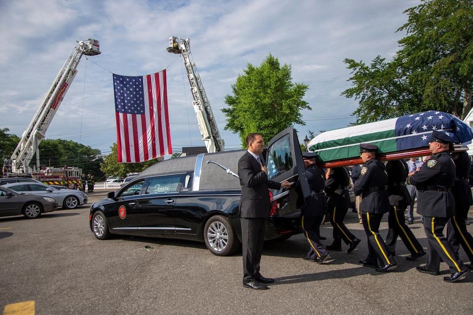The casket for Luis Alvarez, the NYPD detective