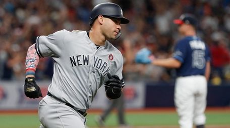 New York Yankees' Gary Sanchez, rounds the bases
