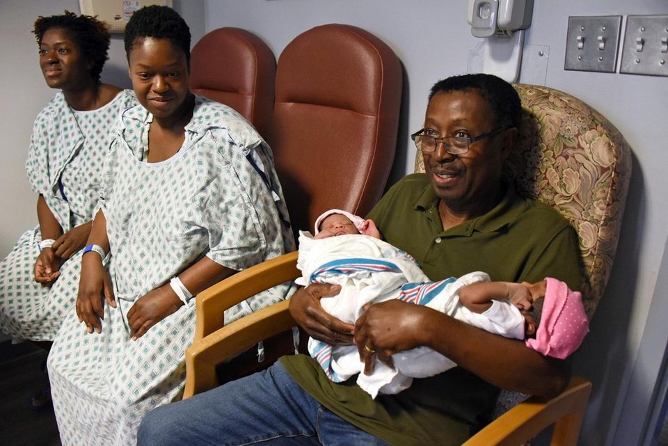 Sisters Shari Cumberbatch, left, and Simone Cumberbatch, right,