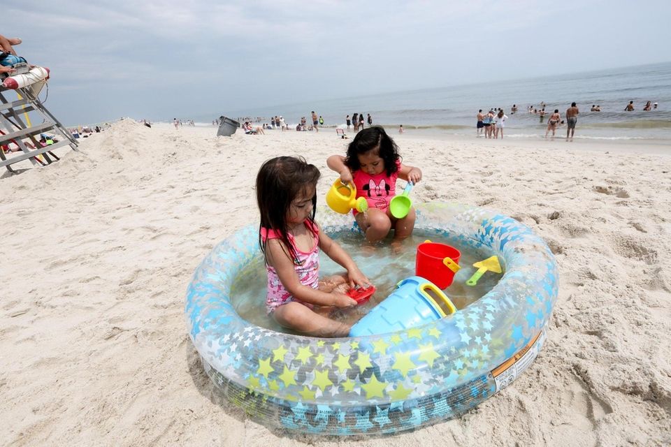 Isabella Quintana, 3, left, from Clifton, New Jersey,