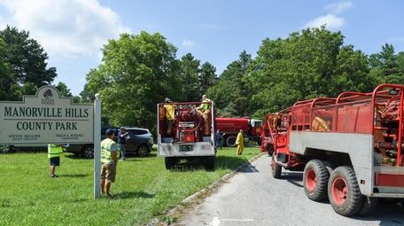 Fire personnel at Manorville Hills County Park on