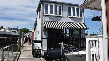This three-story Port Washington home has three bedrooms,