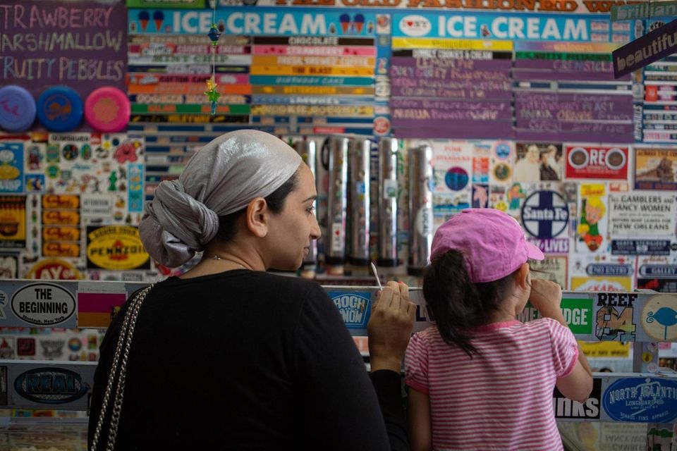 Nearby residents Diana Khanimov and her daughter Eliana,