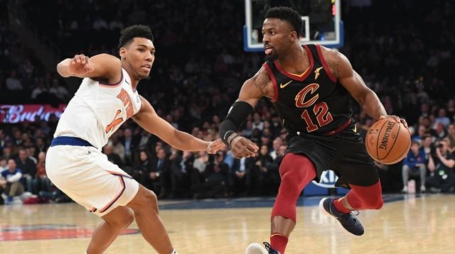Cavaliers guard David Nwaba is defended by Knicks... Cavaliers guard David Nwaba is defended by Knicks