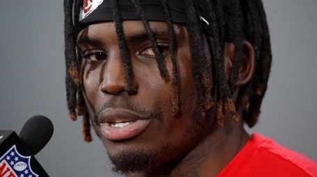 Chiefs wide receiver Tyreek Hill talks to the