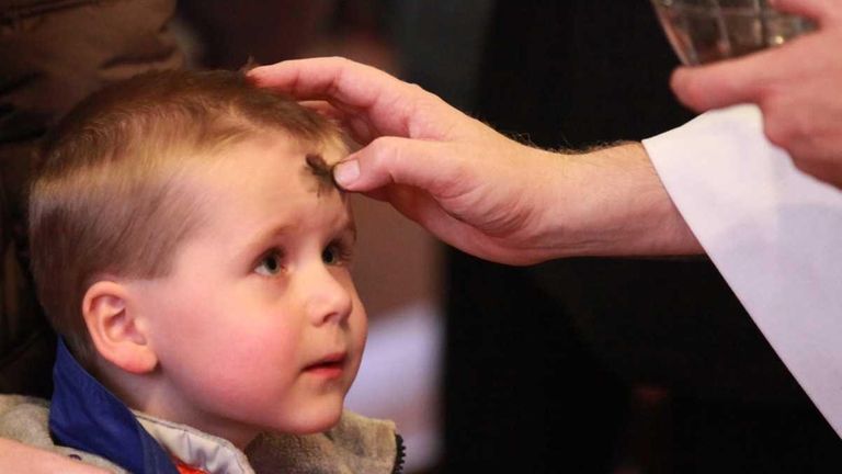 A young parishioner of Infant Jesus Roman Catholic