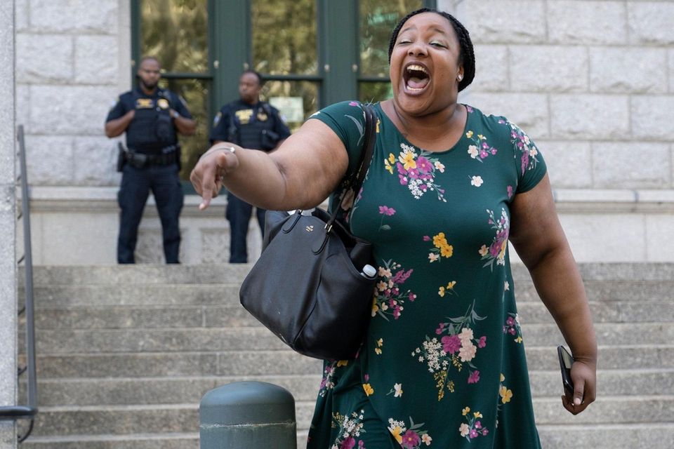Emerald Garner, in Brooklyn, reacts after being told