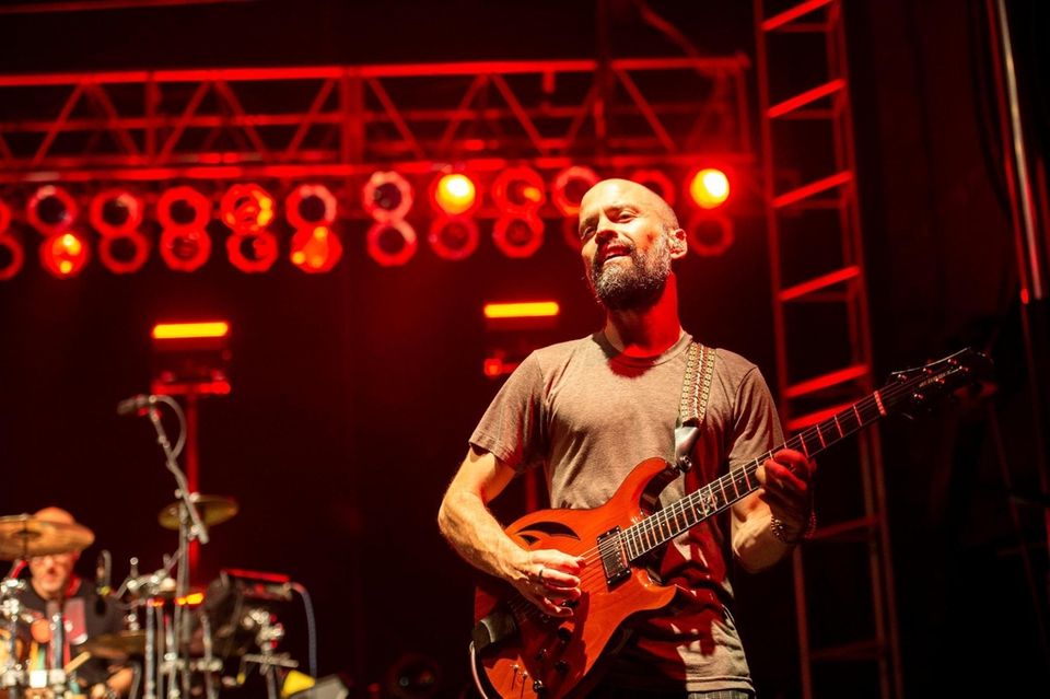 Guitarist Mike Rempel performs with Lotus at the