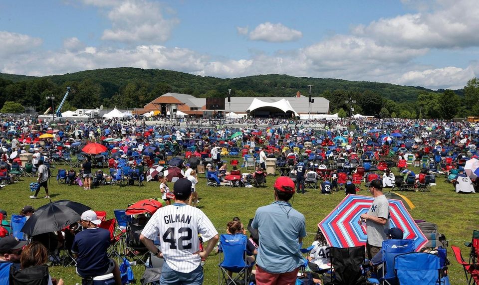 Fans wait for the start of the Baseball