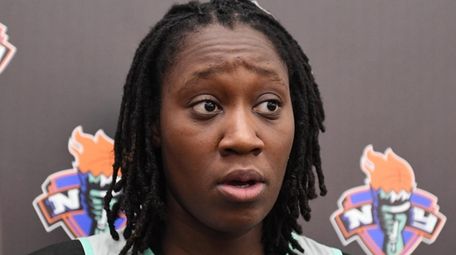 Liberty center Tina Charles speaks to the press
