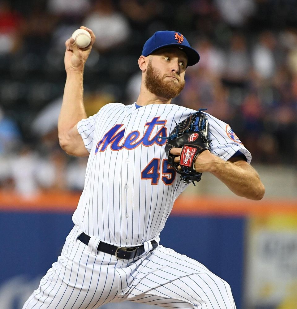 New York Mets starting pitcher Zack Wheeler delivers