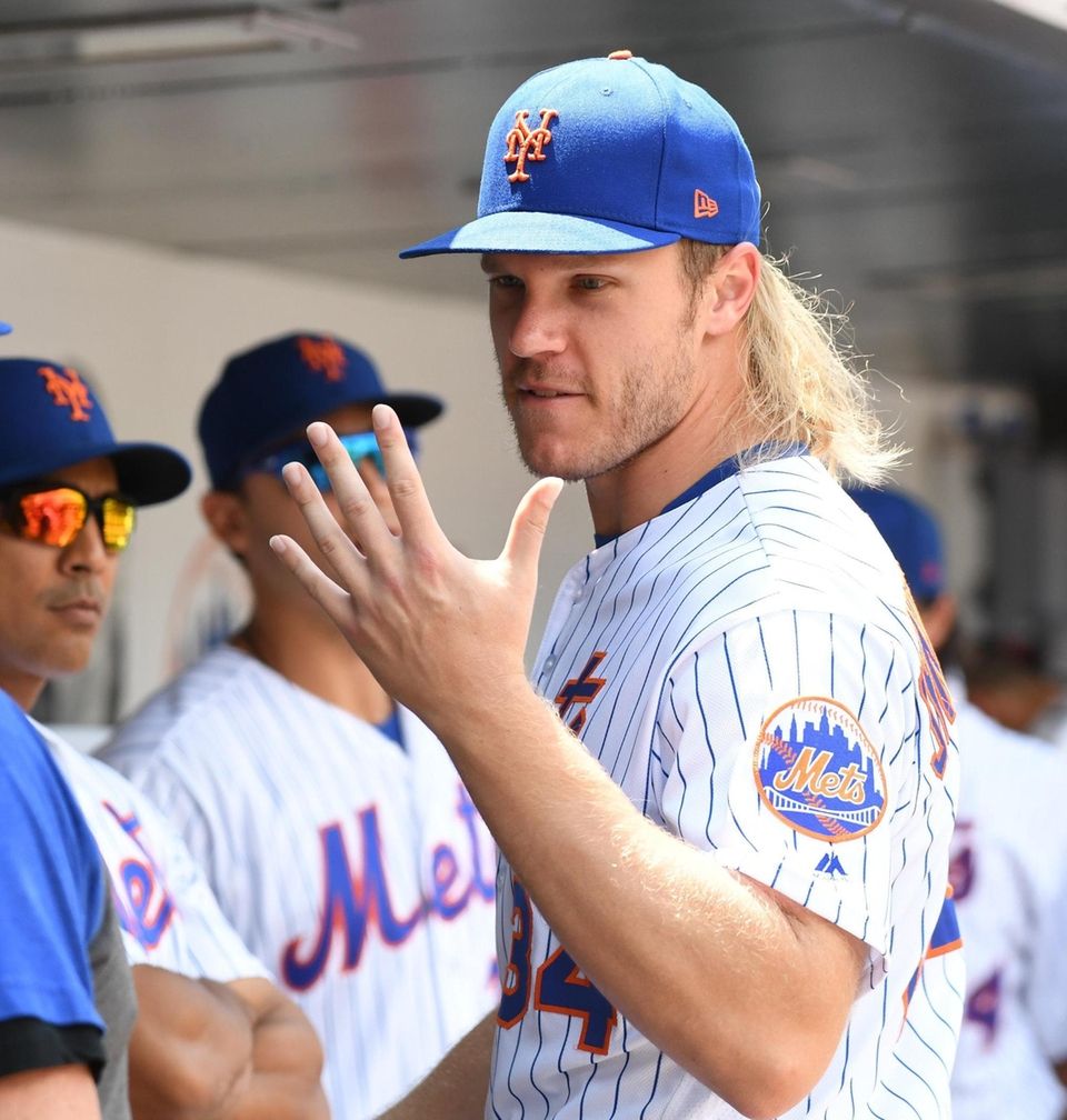 New York Mets pitcher Noah Syndergaard gestures in