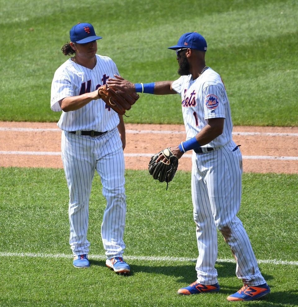 New York Mets starting pitcher Jason Vargasis greeted