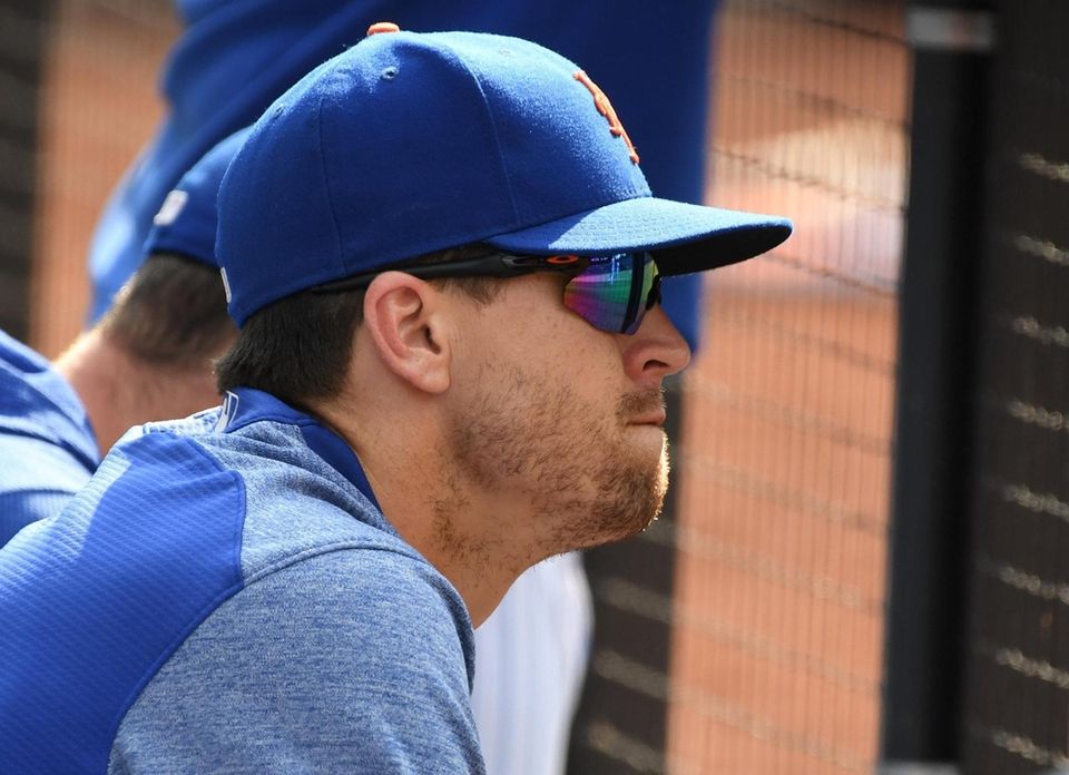 New York Mets pitcher Jacob deGrom looks on