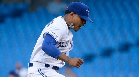 Marcus Stroman reacts after Indians shortstop Francisco Lindor,