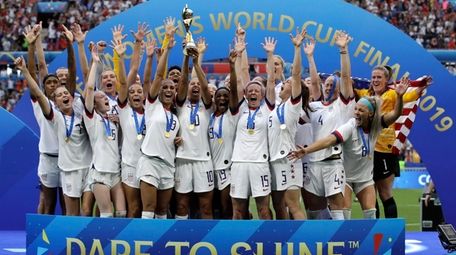 The United States women's national team celebrates with