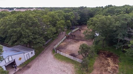 This almost-6-acre Medford property includes nine paddocks, 22