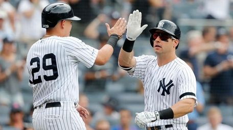 Mike Tauchman of the Yankees celebrates his second-inning