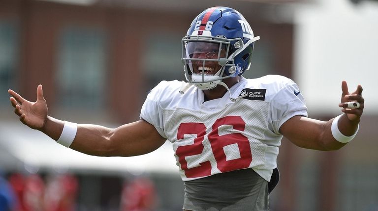 Giants running backSaquon Barkley has a laugh with