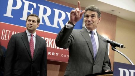 Republican presidential candidate Texas Gov. Rick Perry gestures