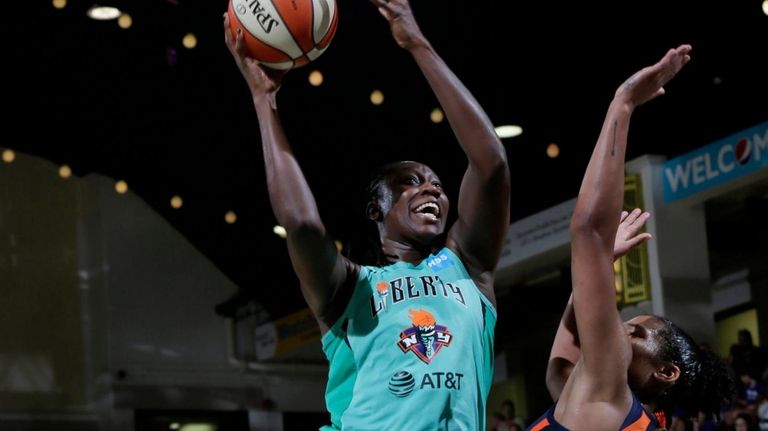 Liberty center Tina Charles shoots the ball against