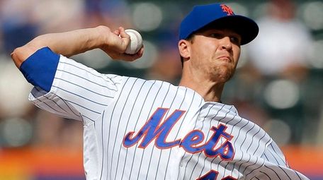 Mets pitcher Jacob deGrom delivers during the first