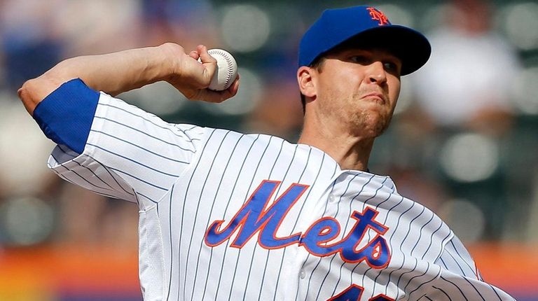 Mets pitcher Jacob deGrom delivers during the first